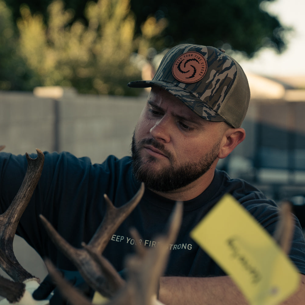 KEEP YOUR FIRE STRONG Snapback in Mossy Oak / Bottomland